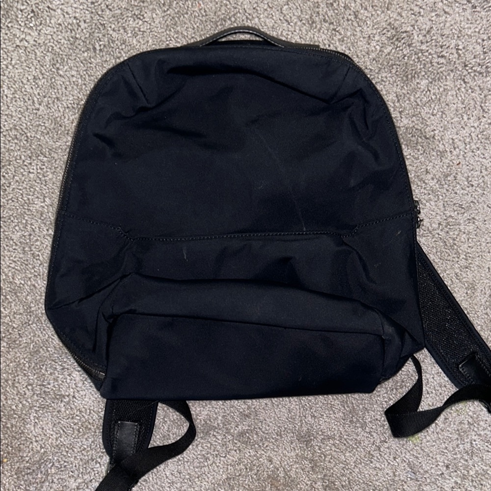 Away Travel Small Backpack in Black with Luggage Sleeve